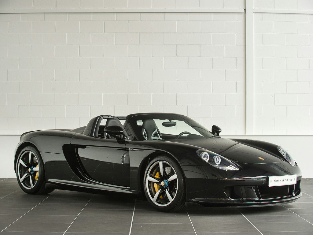 Unleashing the Beast: The 2004 Porsche Carrera GT - Where Speed Meets Elegance