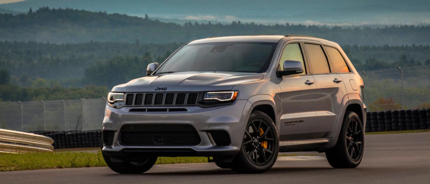 Why do some Jeep Grand Cherokees experience water leaks into the cabin, and how can this be prevented?