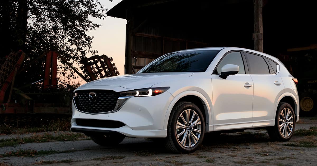 How to address engine hesitation or stalling issues in the Mazda CX-5?