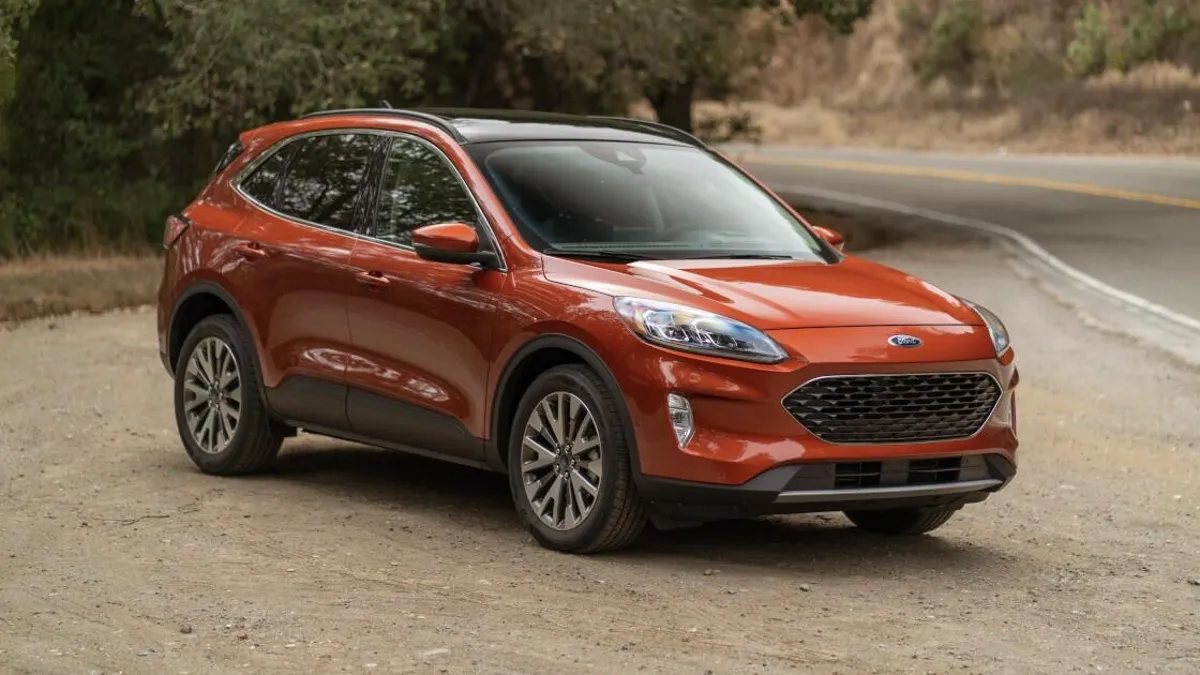 What steps should be taken if the 2018 Ford Escape’s adaptive headlights are not functioning correctly?